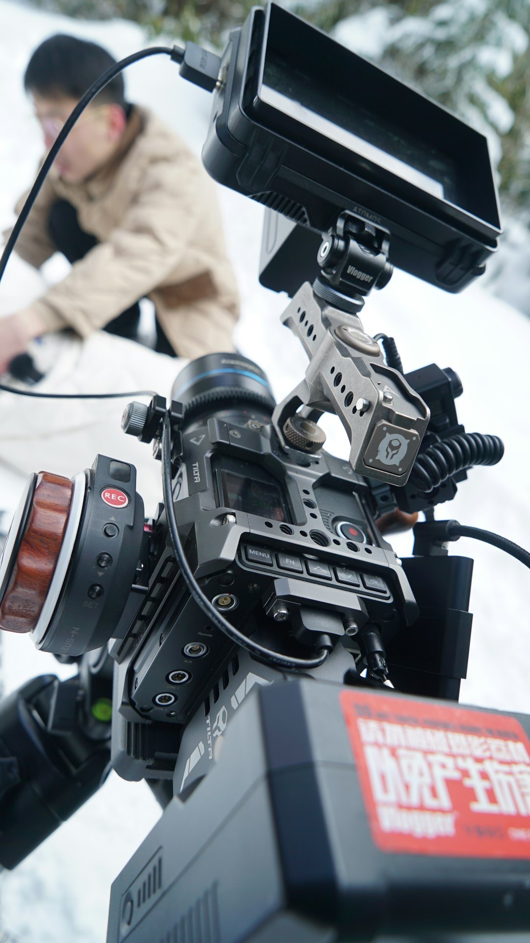 Camera operator filming a live television broadcast