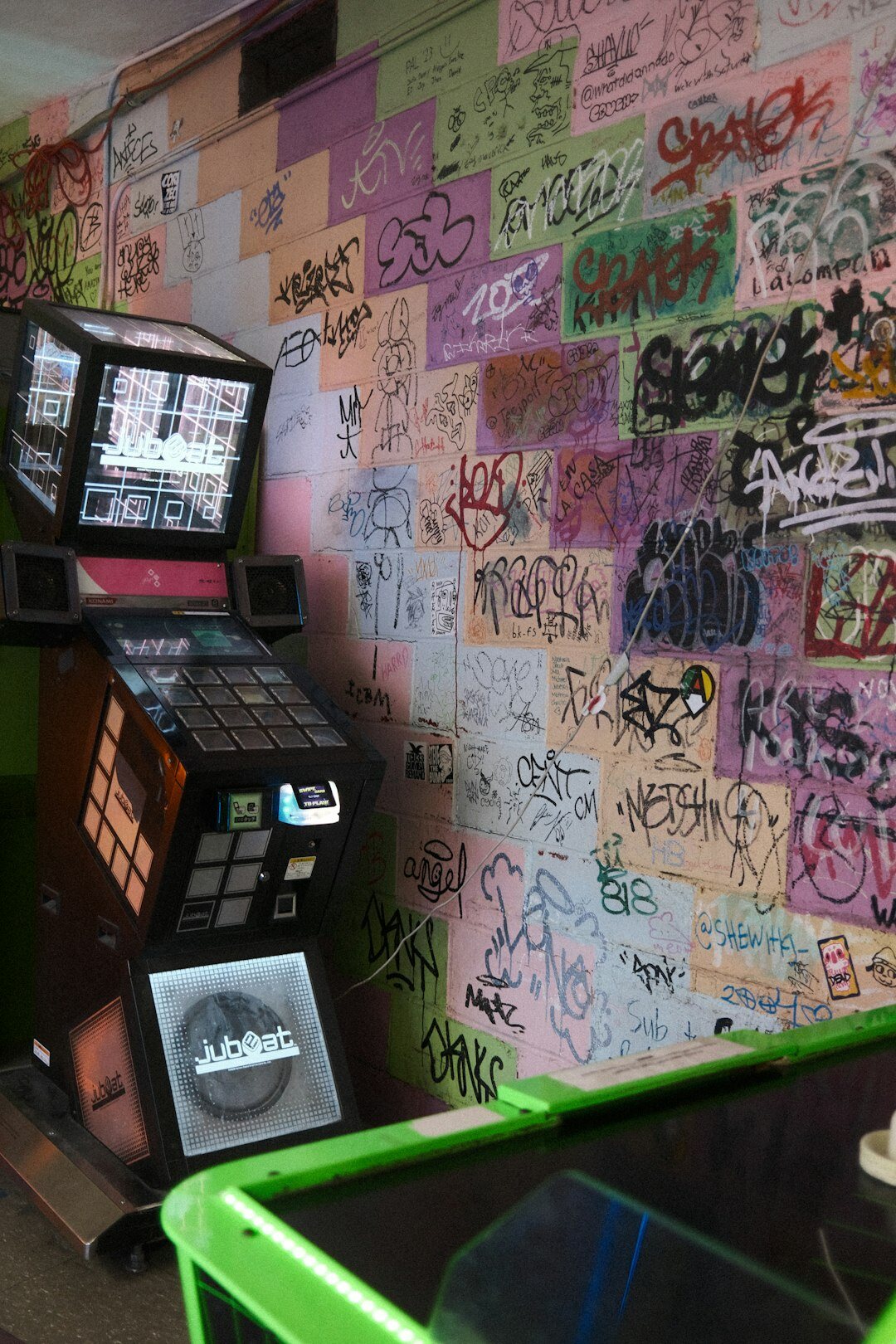 Broadcast control room with wall of live video monitors
